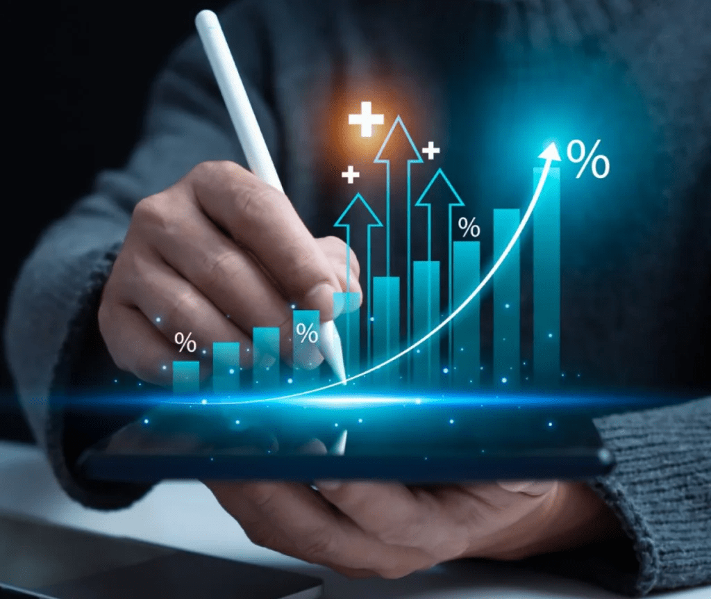 Businessman analyzing data on a tablet, displaying a graph and bar chart for performance metrics.